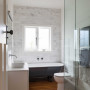 bathroom, white bathroom, neutral bathroom, renovated bungalow, clawfoot bath, bathroom feature wall