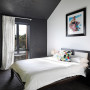 bedroom, black and white bedroom, green feature wall, black bedroom, resene nocturnal 