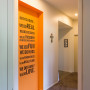 entranceway, hallway, orange paint, writing on walls, interior design, white paint 