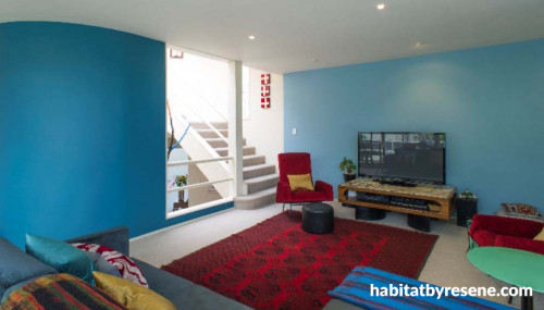 family room, lounge, living room, blue lounge, blue and red, colourful living room