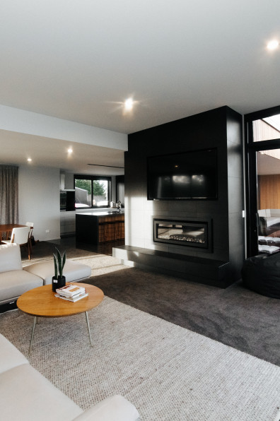 This striking black kitchen is the crown jewel of a contemporary North Otago farmstead
