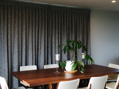This striking black kitchen is the crown jewel of a contemporary North Otago farmstead