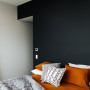 bedroom, black feature wall, black and white bedroom, black bedroom, grey bedroom, resene foundry