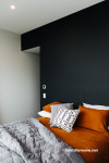 bedroom, black feature wall, black and white bedroom, black bedroom, grey bedroom, resene foundry