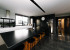 This striking black kitchen is the crown jewel of a contemporary North Otago farmstead photo