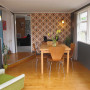 retro, retro house, 1970s home, dining room, wallpaper feature wall, retro wallpaper, grey, orange 