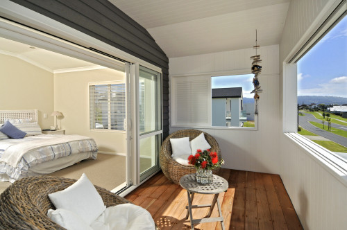 beach house, deck, bedroom, bedroom deck, white bedroom, black and white, covered deck