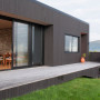 house exterior, black house, brown house, stain, cedar cladding, stone feature wall 