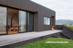 house exterior, black house, brown house, stain, cedar cladding, stone feature wall 