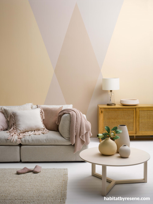 lounge, living room, feature wall, geometric painted pattern, geometric wall, pink, orange