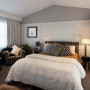 master bedroom, white bedroom, white and grey bedroom, paneled feature wall, neutrals