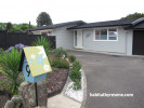 1970s home, retro house, house exterior, grey exterior, letterbox, quirky letterbox 