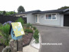 1970s home, retro house, house exterior, grey exterior, letterbox, quirky letterbox 
