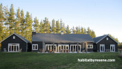 house exterior, barn style house, black house, black exterior, outdoor living area 