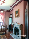 bedroom, red bedroom, fireplace, rose paint, pink bedroom 