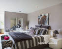 neutral bedroom, painted feature wall, brown bedroom, brown and white paint 