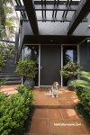 front door, entranceway, 1980s house, contemporary home, black painted exterior