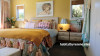 master bedroom, gold bedroom, yellow bedroom, gold feature wall, ochre bedroom