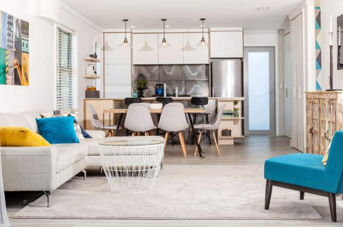 white kitchen, metallic splashback, white dining room, lounge, metallic and white