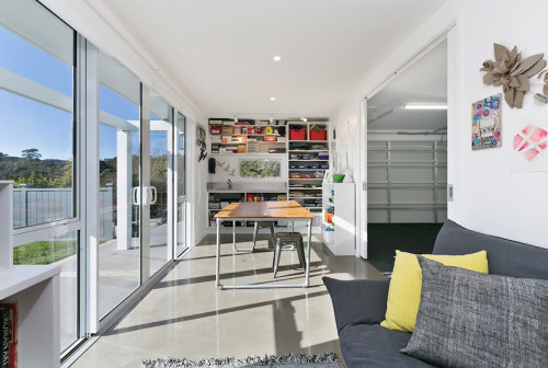 Garage extension, workshop, white, grey, sliding doors, light, interior, shelving, study