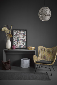 A sophisticated slate bedroom gets a tropical twist