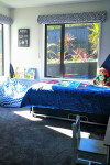 Jen and Dan’s blissful master bedroom sets the stage for more colour to come