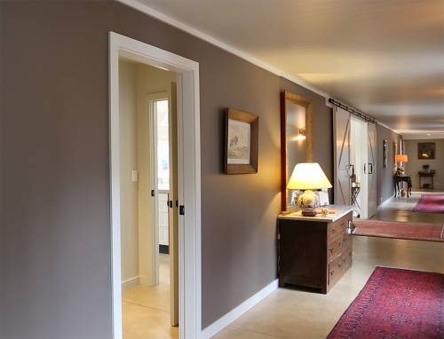 hallway, brown hallway, neutrals, barn style doors, grand, brown paint, brown entranceway