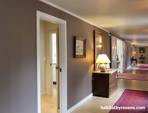 hallway, brown hallway, neutrals, barn style doors, grand, brown paint, brown entranceway 