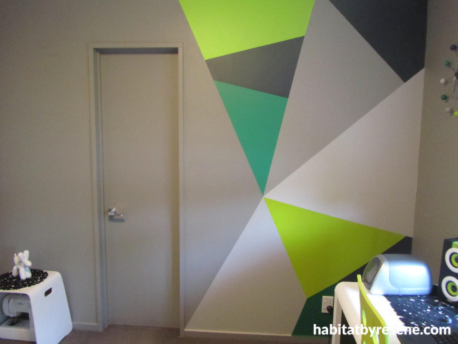 geometric painted wall, office, grey study, shades of green paint, interior design 