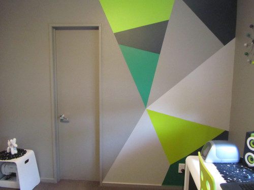 geometric painted wall, office, grey study, shades of green paint, interior design