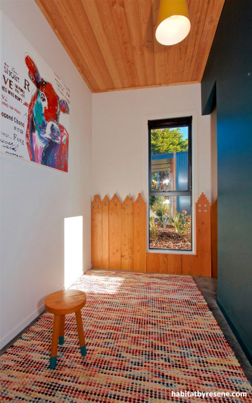 hallway, holiday cabin, dark blue feature wall, timber ceiling, play area