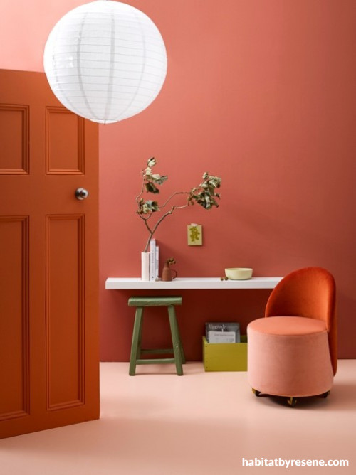 sitting room, study, home office, pink feature wall, pink room, pink floor, orange door