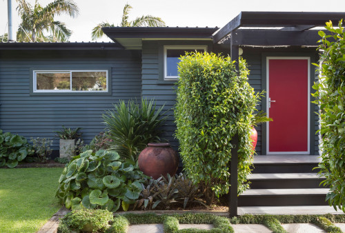 grey exterior, red front door, grey house, grey weatherboards, garden, entranceway