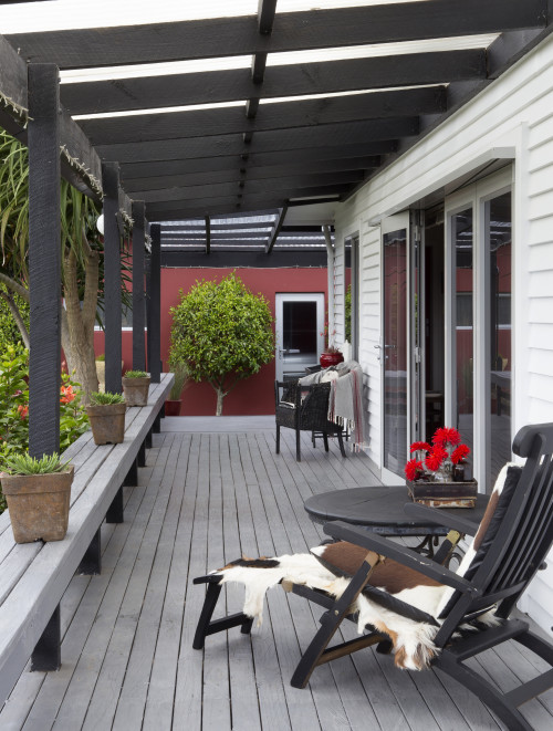 outdoor living, deck, house exterior, white house, white exterior, red exterior, veranda