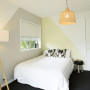 bedroom, geometric pattern, white bedroom, yellow paint, grey paint 