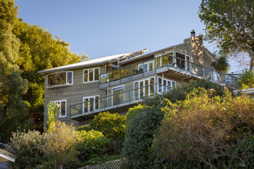 house exterior, brown house, stained house, wood stain, cedar exterior, cedar house