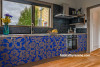 kitchen, blue kitchen, blue and gold cabinetry, patterned cabinetry, grey kitchen