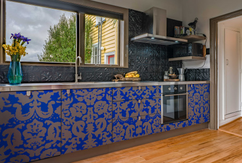 kitchen, blue kitchen, blue and gold cabinetry, patterned cabinetry, grey kitchen