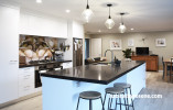 kitchen, black and white kitchen, neutral kitchen, black benchtop, floral splashback, resene ash