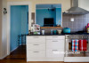 kitchen, yellow kitchen, blue lounge, yellow and blue, pastel yellow