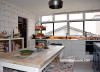 kitchen, geometric wallpaper, wallpaper feature wall, orange and white kitchen, resene sea fog