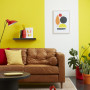 yellow lounge, yellow living room, yellow feature wall, resene turbo, yellow interior