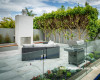 garden, outdoor fireplace, outdoor dining, outdoor entertaining, grey outdoors, planter beds 