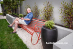 garden, vintage bench seat, raised planter beds, grey outdoors, red garden seat 