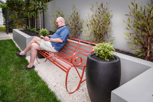 garden, vintage bench seat, raised planter beds, grey outdoors, red garden seat