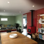 red dining room, open plan living, green living room, bookshelf inspiration, Resene 