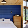 painted lockwood, lockwood interior, blue lockwood, blue feature wall, blue bedroom