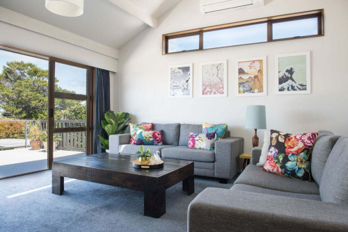 lounge, living room, white lounge, white living room, floral features, high ceiling