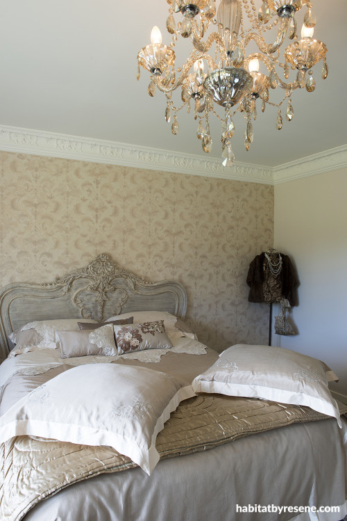 bedroom, master bedroom, patterned wallpaper, neutrals, feature wall, chandelier 