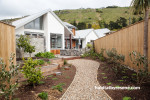 bungalow, exterior, cedar cladding, stone exterior, white house, garden 